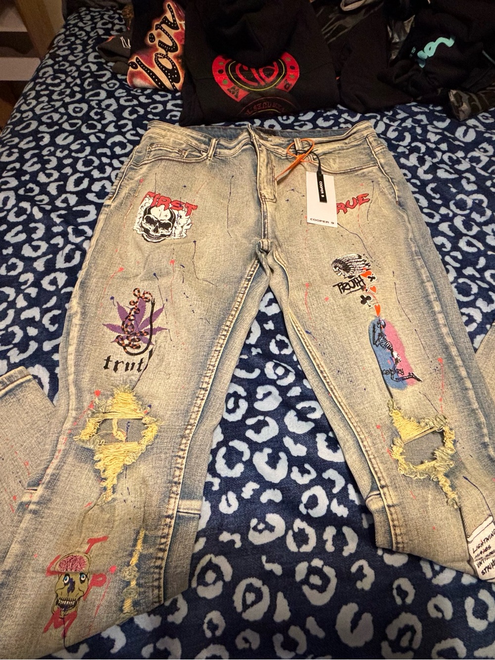 Light Blue Distressed Skinny Jeans with Multicolor Graphic Patches